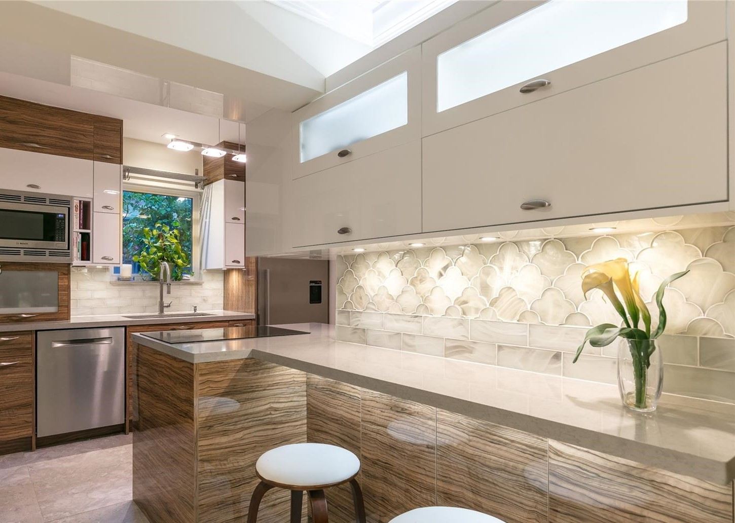 Miami kitchen remodel with scallop tile and wood cabinetry built to a defined allowance and finish schedule