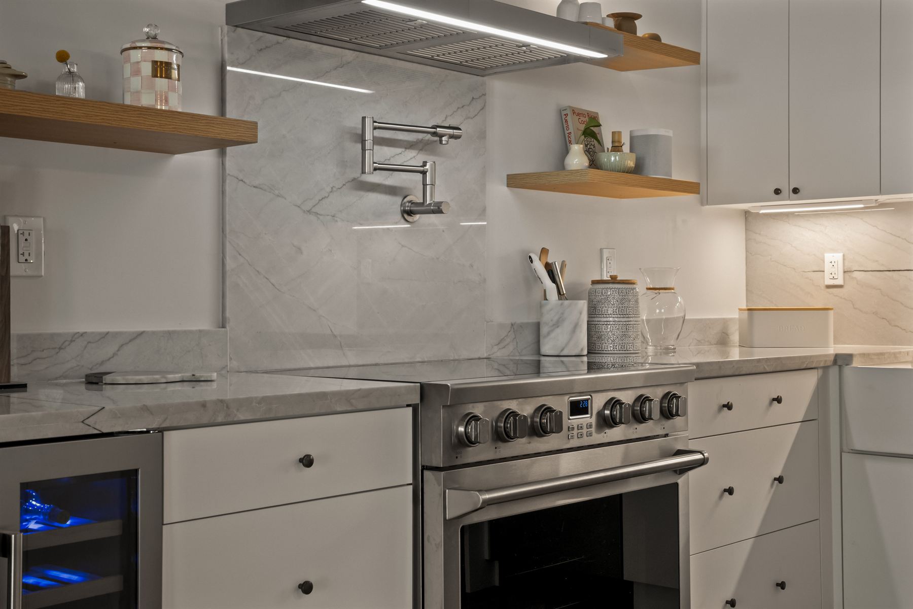 Permitted kitchen remodel in Miami with marble slab backsplash installed by licensed trades